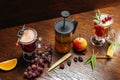 Various autumn or winter seasonal alcohol hot cocktails. Royalty Free Stock Photo