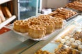 Various baked sweet cookies on bakery showcase Royalty Free Stock Photo