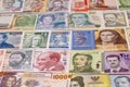 Various banknotes from different countries displayed on a table Royalty Free Stock Photo