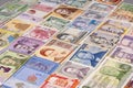 Various banknotes from different countries displayed on a table Royalty Free Stock Photo