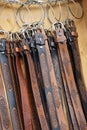 Various belts on market stall