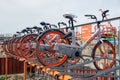 Various bicycles on a rack, available for rent Royalty Free Stock Photo