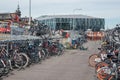 Various bicycles on a rack, available for rent