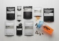 Respective packets. A transparent shaker bottle with an orange Royalty Free Stock Photo