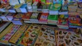 various books and educational teaching aids are sold in a traditional market