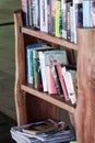 Various books in a mini library in a beach resort in Indonesia, Bintan Indonesia, December 16, 2018