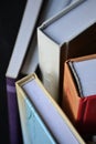 various books with a thick cover