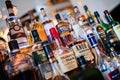 Various bottles of alcoholic beverages in the bar Royalty Free Stock Photo