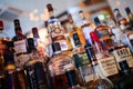 Various bottles of alcoholic beverages in the bar