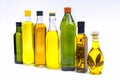 Multi-colored glass bottles filled with various types of olive oil Royalty Free Stock Photo