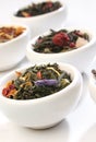 Various bowls of premium tea leaves