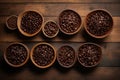 various bowls scattered on a wooden table full of roasted coffee seeds