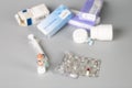 Various boxes of medication, blisters with pills, syringes and white bottles with medication Royalty Free Stock Photo