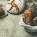 Various bread loaves on grey concrete background, square crop Royalty Free Stock Photo