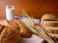 Various breads with milk and news paper Royalty Free Stock Photo