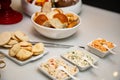 Assorted breads and pates arranged on a buffet table