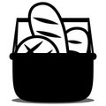 Various breads in a picnic basket Royalty Free Stock Photo