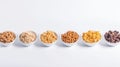 Various breakfast cereals, whole grain cereals, diet healthy food, White background isolate. AI generated. Royalty Free Stock Photo