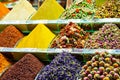 Various bright colored powder spices and fruit herbal tea and dried vegetables on market in Istanbul, Turkey Royalty Free Stock Photo