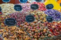 Various bright colored powder spices and fruit herbal tea and dried vegetables