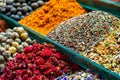 Various bright colored powder spices and fruit herbal tea and dryied vegetables on market in Istanbul, Turkey Royalty Free Stock Photo