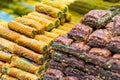 Various bright colored turkish delights sweets baklava lokum and dried fruits vegetables on market in Istanbul, Turkey Royalty Free Stock Photo