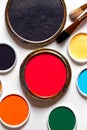 Various bright paints on white background. Palette with paints and brushers Royalty Free Stock Photo