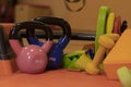 Various bright sports equipment. Kettlebells, fitness bands, cubes, rugs, dumbbells, barbell. Sport concept.