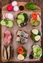 Various bruschettas on wooden background.