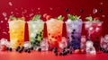 Various bubble tea flavors in plastic cups accompanied by dark boba pearls on a surface with an orange background Royalty Free Stock Photo