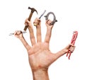 Various building tools in hand, isolated. Handyman concept Royalty Free Stock Photo