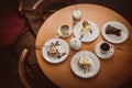 Various cakes and coffee on a table, top view Royalty Free Stock Photo