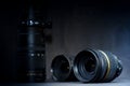 Various camera lenses for digital cameras on a black background, isolated Royalty Free Stock Photo