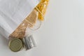 Various canned food and raw cereal grains on a table with copy space Royalty Free Stock Photo