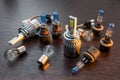 Various Car electric bulbs for parts in headlight on dark background. many new 12v car filament diod led halogen lamps