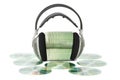 Various CD / DVD with headphones Royalty Free Stock Photo