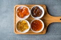 Various Ceramic bowl of Fruit jams Fig, Quince, Bergamot Citrus, Watermelon in wooden tray / Marmalade. Royalty Free Stock Photo