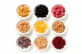 Various cereals placed in various bowls on white background, Various cereals on white background