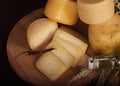 Various cheeses on the wooden board Royalty Free Stock Photo