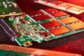 various chips, digital boards. Components of technical devices in creative lighting. Processor, RAM and other parts Royalty Free Stock Photo