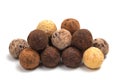 Various chocolate candies close-up. Belgian truffles on a white background Royalty Free Stock Photo