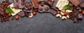 Various chocolate pieces, coffee beans and nuts Royalty Free Stock Photo