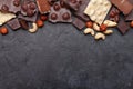 Various chocolate pieces, coffee beans and nuts Royalty Free Stock Photo