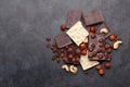 Various chocolate pieces, coffee beans and nuts Royalty Free Stock Photo
