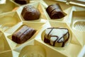 Various chocolates in an elegant chocolate box