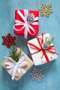 Various Christmas boxes of gifts festively decorated On a blue background Royalty Free Stock Photo