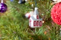 Various Christmas toys on a decorated evergreen tree Royalty Free Stock Photo
