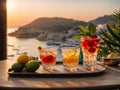 Various cocktails, sea view, sunset juice glasses fruit berries citrus restaurant