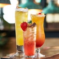 Various cocktails in tall glasses with a strawberry and passion fruit decoration on top Royalty Free Stock Photo
