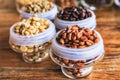 Various coffee beans on wooden background.